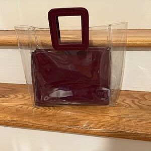 Staud burgundy clear bag